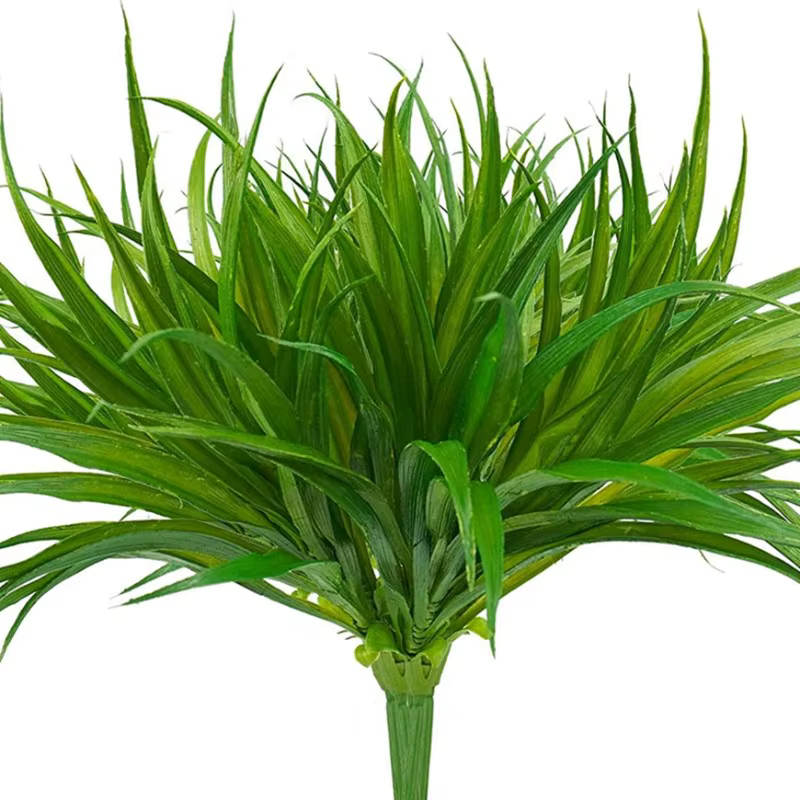 Plantes artificielles d'herbe de printemps