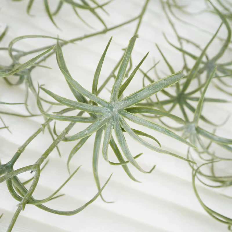 Branches artificielles de plantes vertes