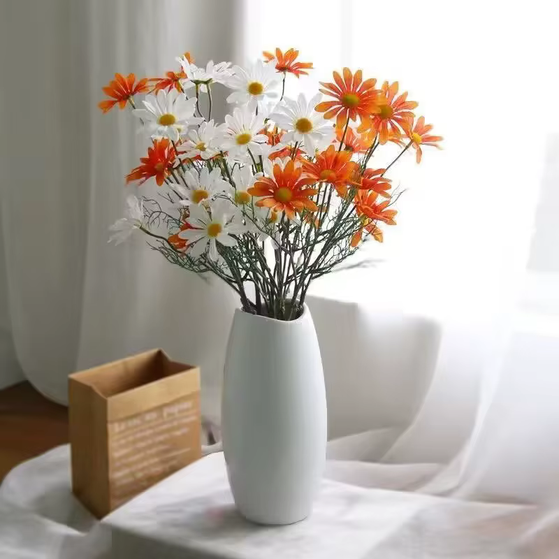 Bouquet de marguerites et de chrysanthème artificielles