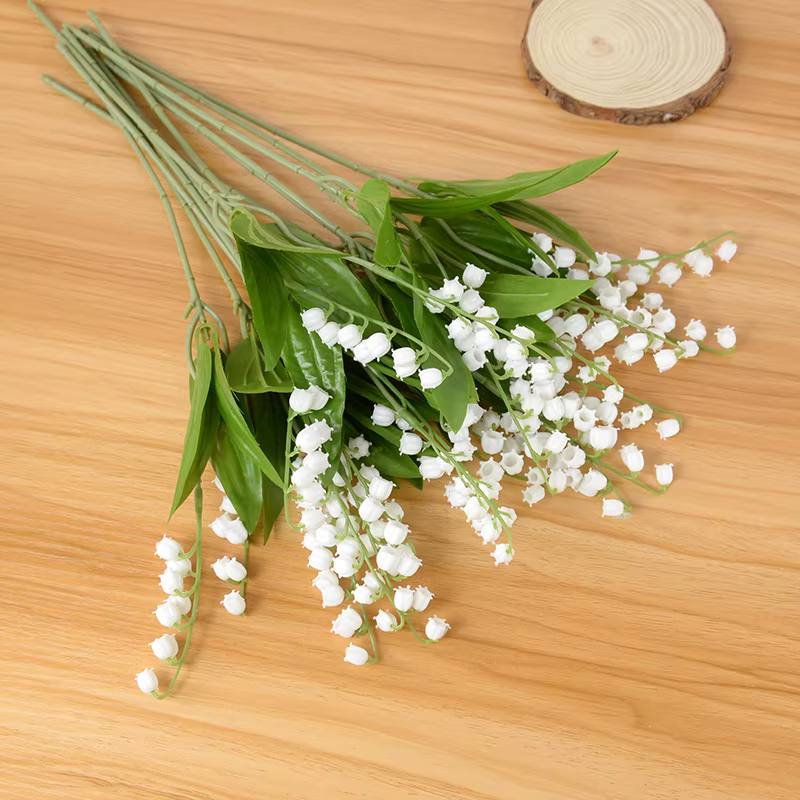 Fleur d'orchidée artificielle de muguet blanc