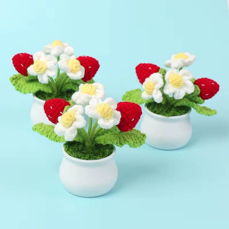 Fleur tricotée en forme de fraise