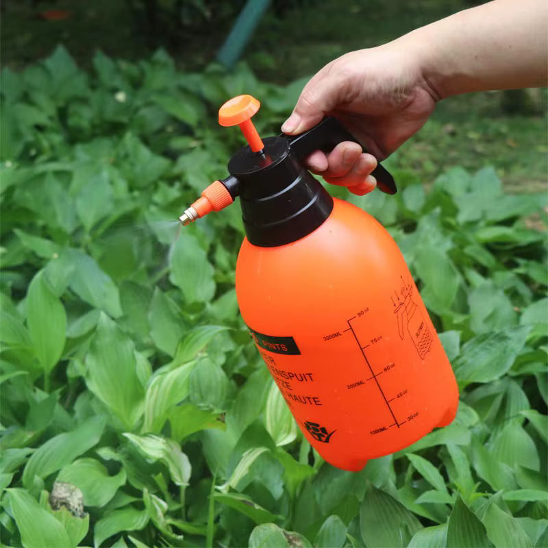 Arrosoir épais domestique pour l'arrosage des fleurs