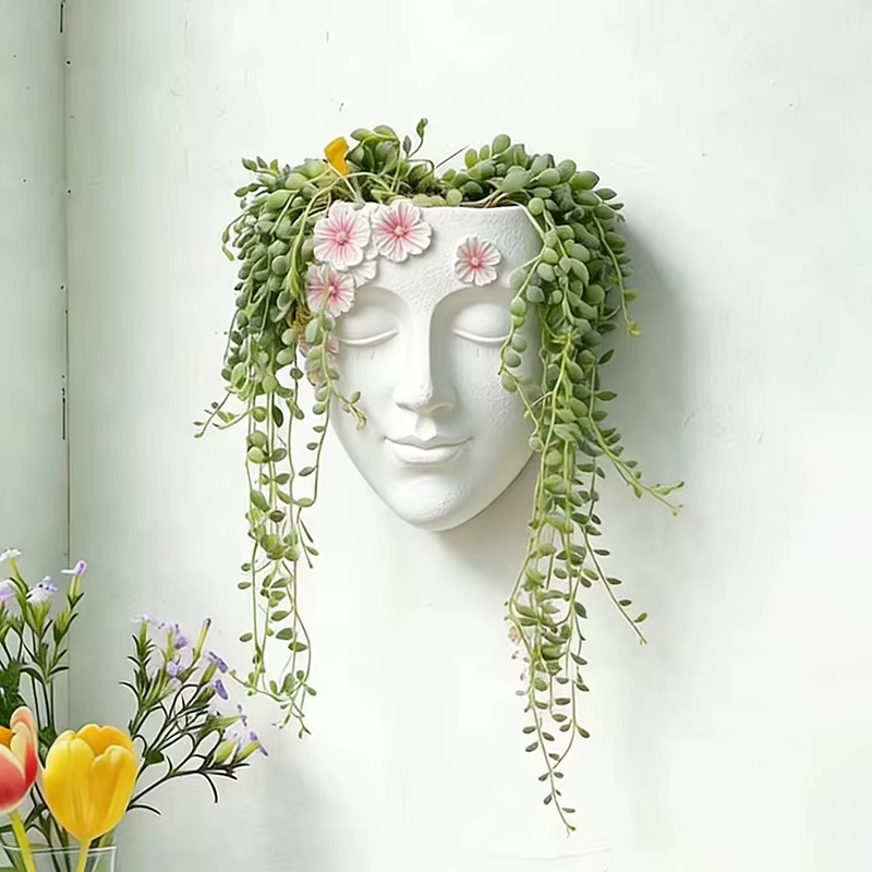Pot de fleurs mural classique en forme de tête