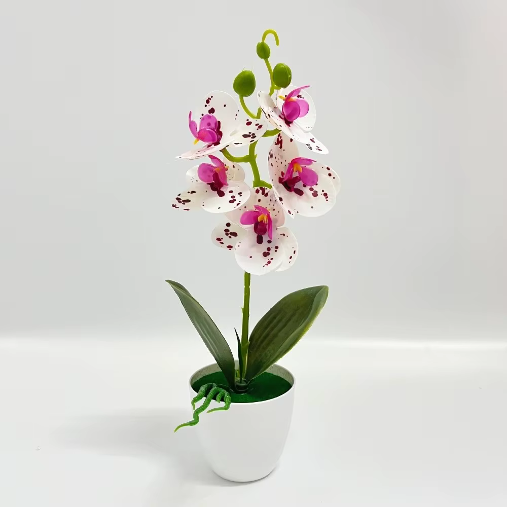 Orchidée artificielle rose en pot