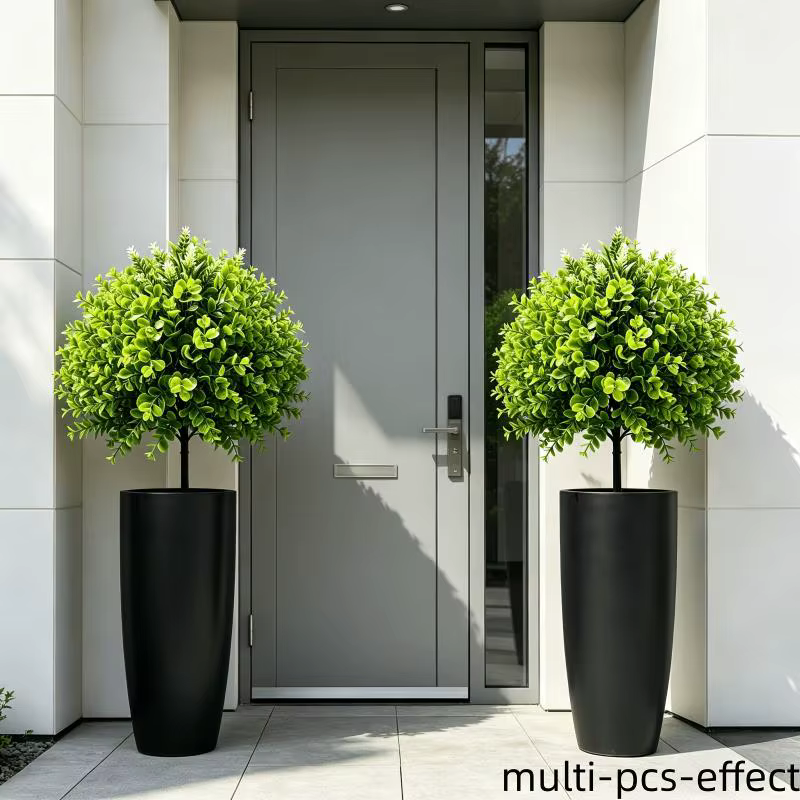 Plantes vertes artificielles sur piquet