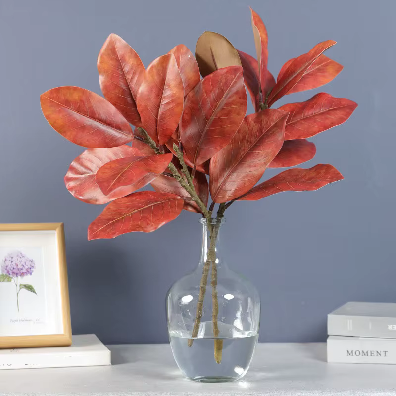 Plantes artificielles en feuilles de magnolia simulées
