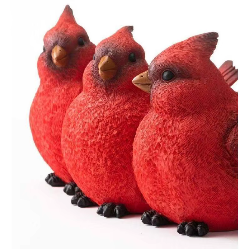Pot de fleur à trois oiseaux rouge de dessin animé