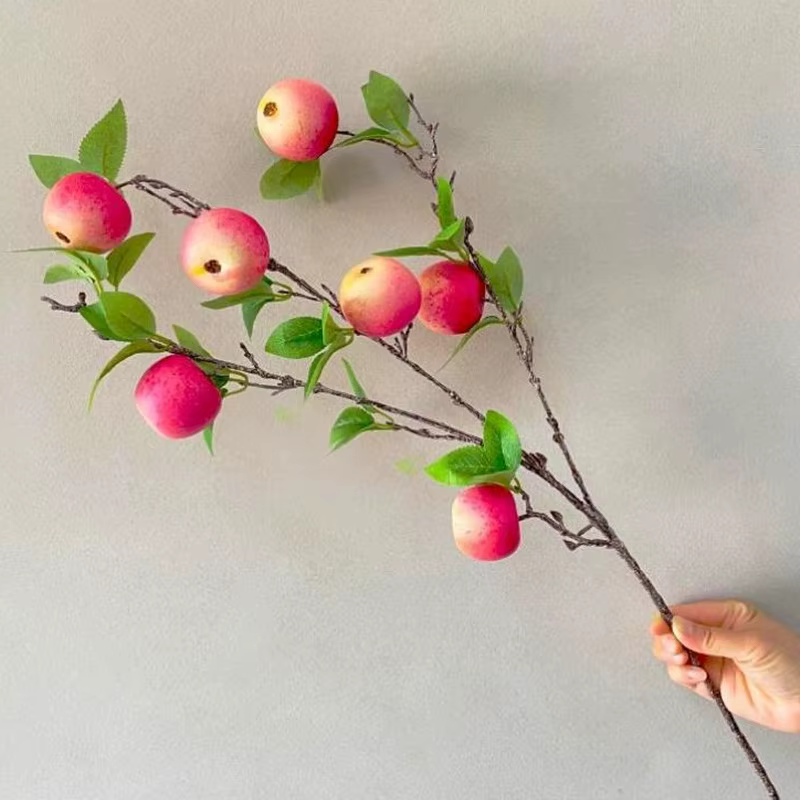 Une branche d'arbre à pommes de grenade artificielle 7 plante verte de fruits de pomme pour la décoration florale murale de fête de mariage