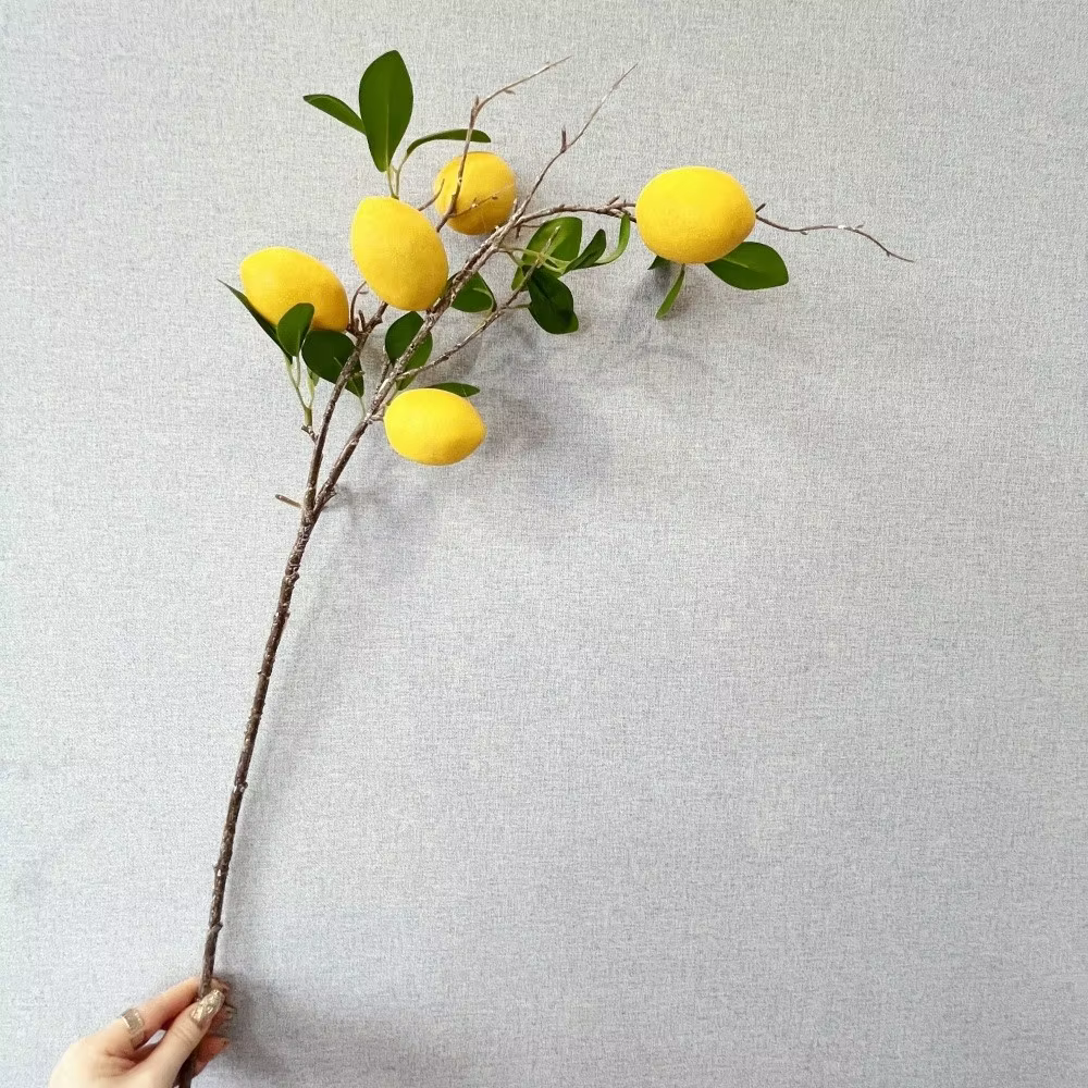 Branche de citron artificielle en feuilles vertes