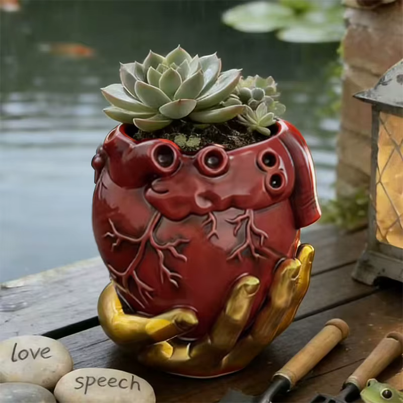 Pot de fleurs en résine rouge en forme de cœur anatomique avec support doré pour plantes succulentes
