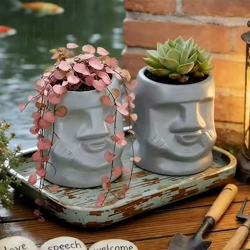Pot de fleurs en céramique créatif en forme de visage de Moaï