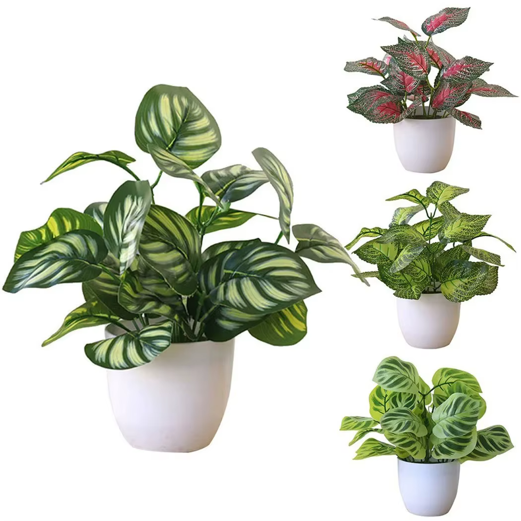 Pot de plantes à feuillage artificiel
