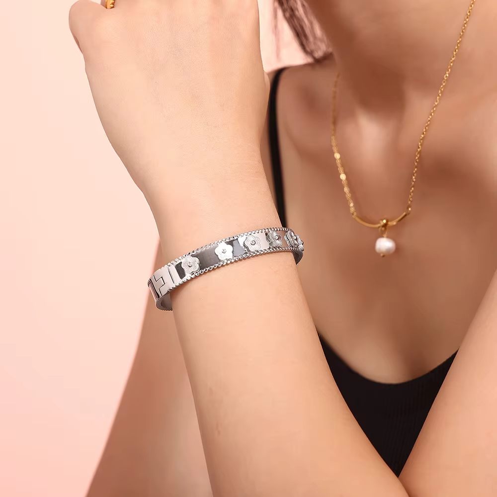 Bracelet de luxe en acier inoxydable plaqué or 18 carats pour femme, ensemble de matiques, gaufrage de fleurs, étanche, bijoux Nette, vente en gros