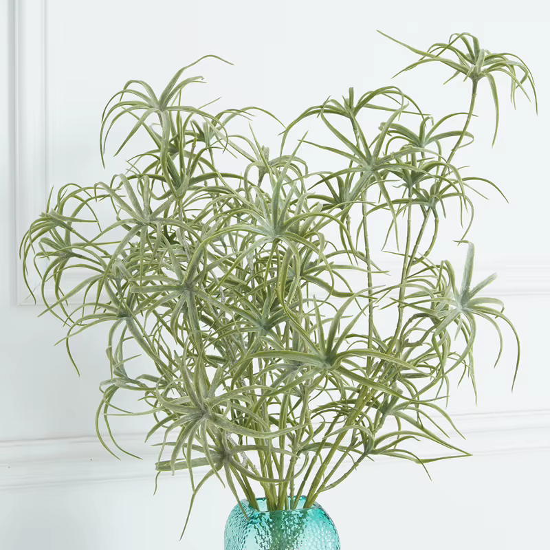 Branches artificielles de plantes vertes