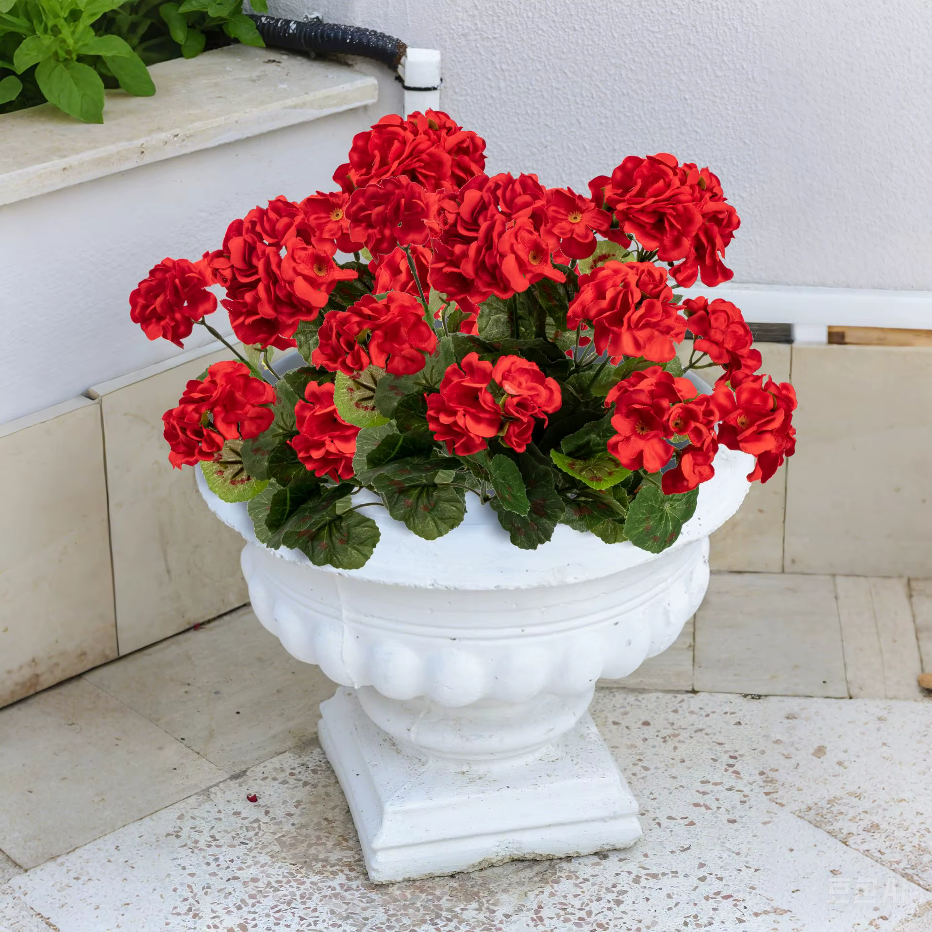 Fleurs artificielles en forme de géranium