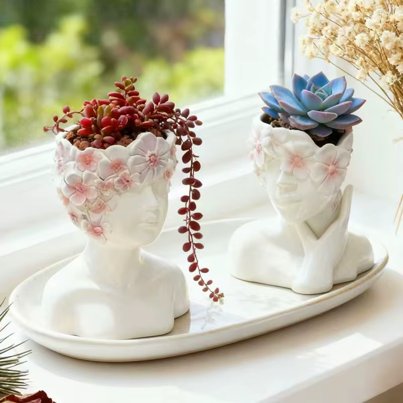 Pot de fleurs en résine en forme de jeune fille