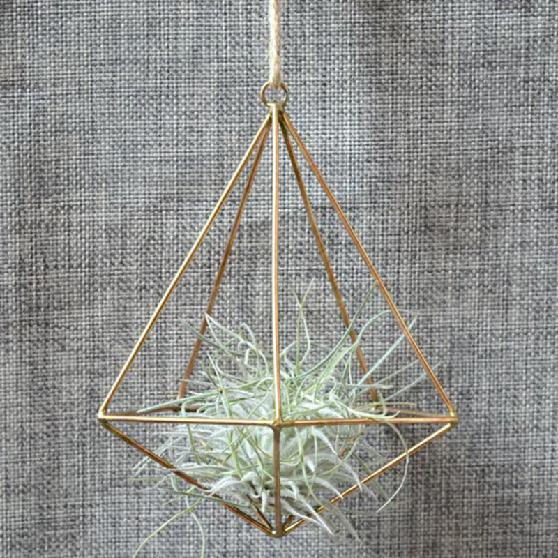 Pot mural géométrique en macramé
