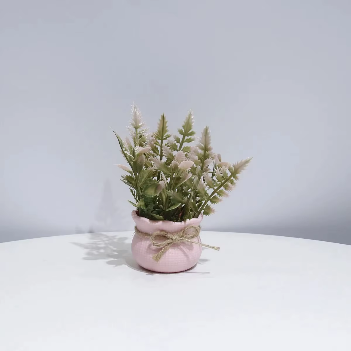 Mini-fleurs artificielles roses en pot