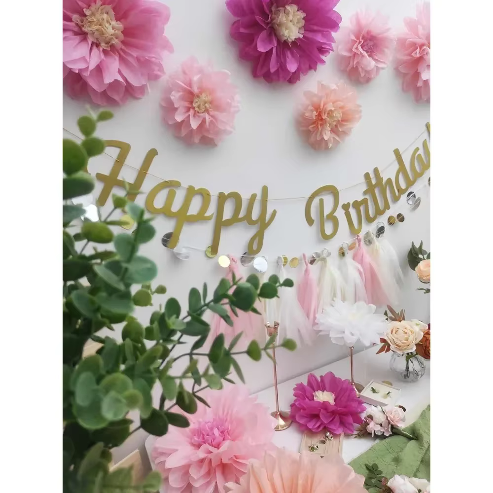 Assortiment de pompons en papier de soie rose