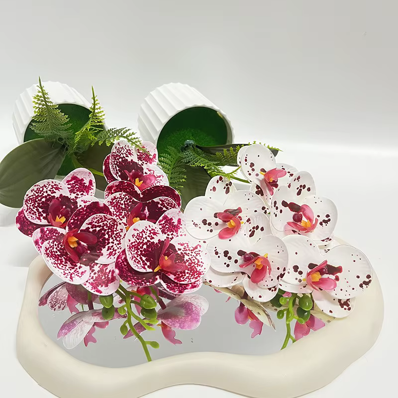Pot de barre verticale avec 5 orchidées papillon