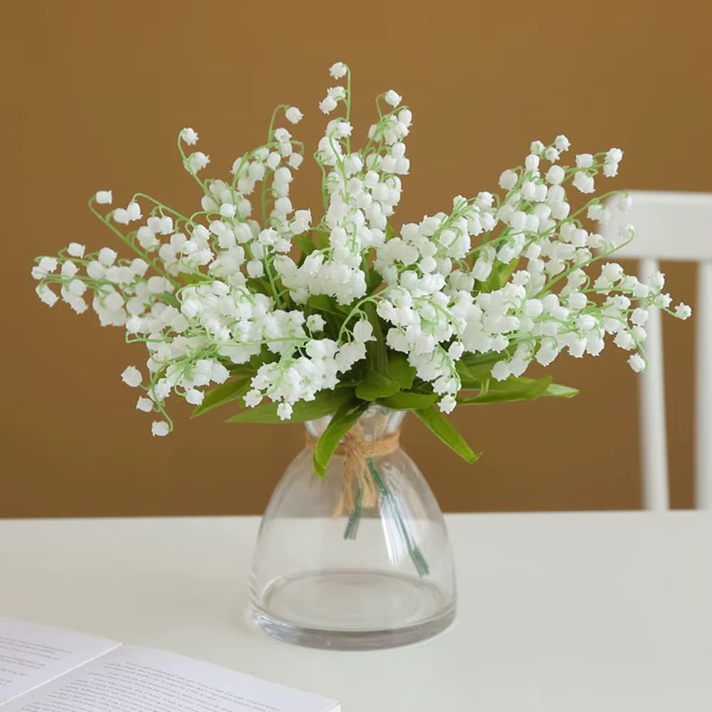 Bouquet de fleurs artificielles de lys blancs du val