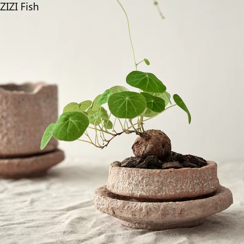 Pot de fleur en céramique fait à la main avec base
