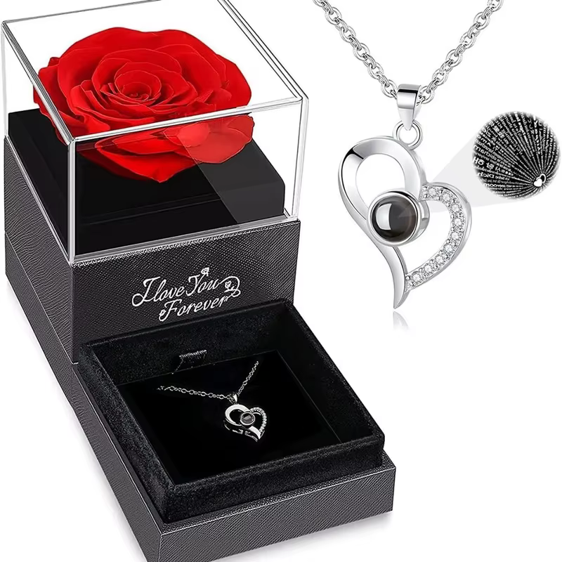 Un ensemble de roses artificielles préservées dans une boîte cadeau