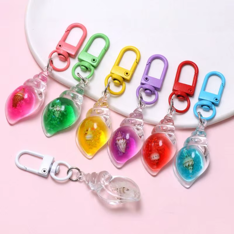 Porte-clés coquillage en acrylique style plage avec huile flottante, lot de 2 pièces, accessoire de sac idéal pour l'ambiance estivale