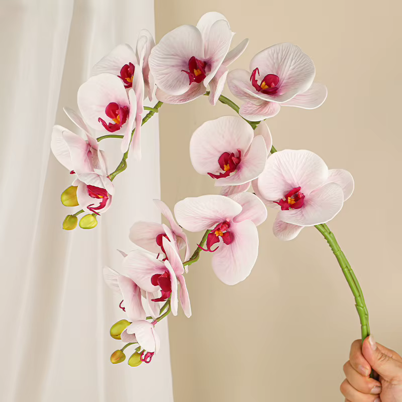 Branche de fleurs artificielles orchidées