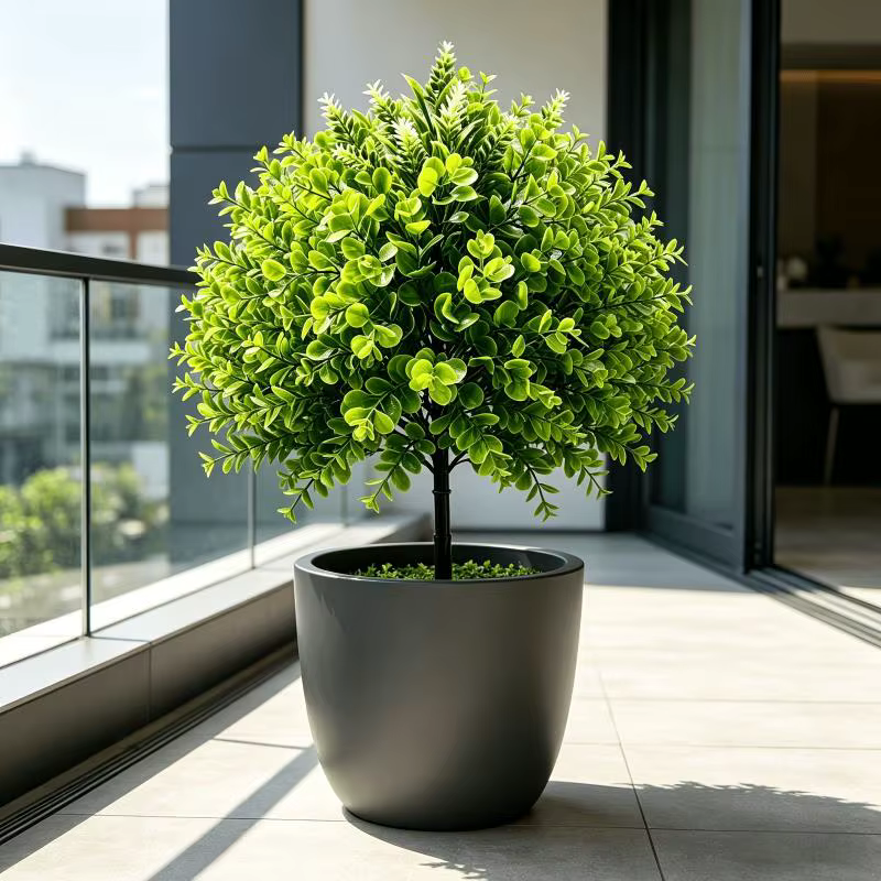 Plantes vertes artificielles sur piquet