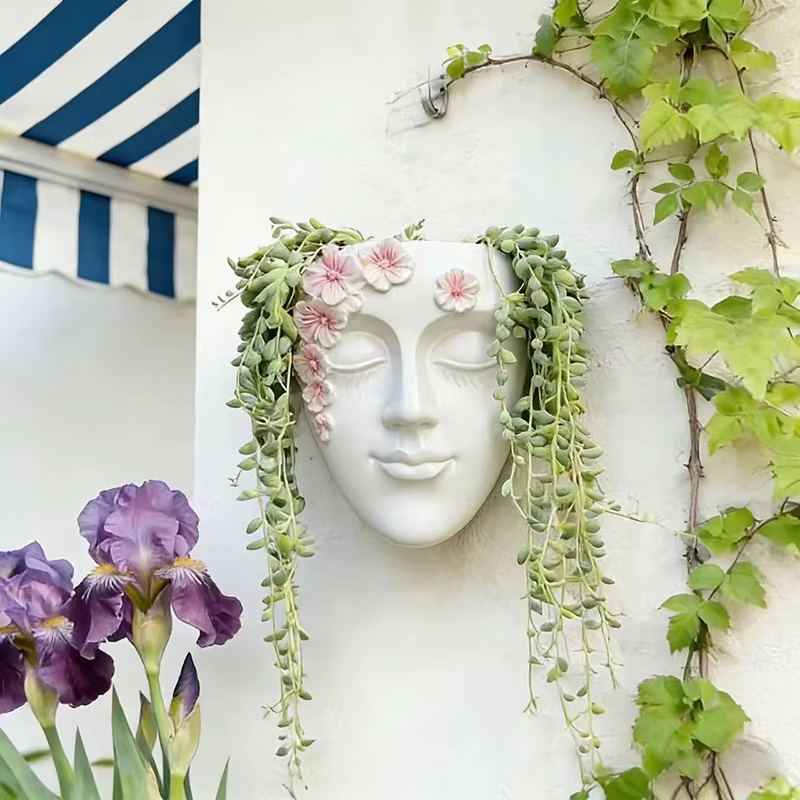 Pot de fleurs mural classique en forme de tête